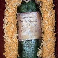 Wine In Crate for my father-in-laws 90th birthday. crate is carrot cake and bottle is rice krispie treats.