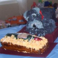 Wine Loving Dog My father-in-law's 90th birthday cakes. Dog is all cake. Crate is cake, bottle is rice krispies. Sadly my FIL suffers from short term...