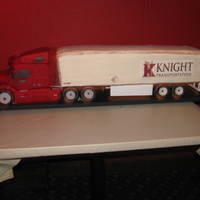 Semi Truck I made this cake for a Christmas party for work. The truck and tires are cereal treats. The trailer is vanilla cake with vanilla frosting....