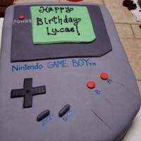 Retro Nintendo Gameboy Cake I used 2 layers of chocolate half sheet sized cake. I soaked it in Chambord liquor & filled the cake in between with chocolate...