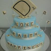 Scrabble Themed Wedding Cake Cake flavour was french vanilla with a simple vanilla butter cream. I covered it in "Tiffany Blue" RTR fondant. The scrabble...