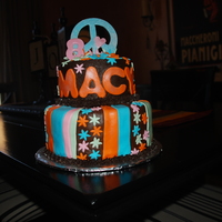 Peace Bottom Tier Chocolate, top tier wasc cake covered in buttercream with with fondant accents made for a friend of mine to match her paper...