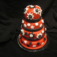 Black, Red & White Birthday Cake This is a mini tiered real cake.The bottom is a 6 inch, the 2nd tier is 5 inch, 3rd tier is a 4 inch, and the top tier is a 3 inch. This...