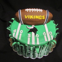 Vikings Football Cake This is a 12" x4" birthday cake that I made. The football is a 9"cake that I carved into a football shape and covered with...