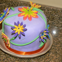 3-D Flower Cake! I used the Wilton flower formers to make the flowers stand up. This is a 5x6 inch cake.