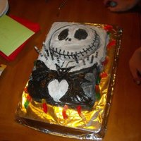 Jack Skeleton I just used a sheet cake with different colors of icing and made this for my sons b-day, just did the design by hand.