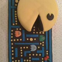 Pac-Man 2.0 Here is the latest version of my pac-man cake! It keeps getting better. Hope u enjoy! .....MACMACMACMACMAC (pacman noise - LOL)!