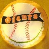 Giants 2010 World Series Champs 2 layer red velvet , cream cheese filled and frosted. Black fondant banner with orange/whi letters made from a Wilton mold - TFL !