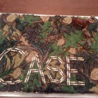 Camo Baby Shower Cake Buttercream, camo covered cake with bullets spelling out baby's name