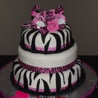 Zebra Striped Birthday Cake I made this cake for my daughters 18th Birthday It is a 3 tier round covered with white fondant and black fondant zebra stripes I made all...