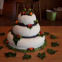 Fruit Themed Wedding Cake Another family wedding cake. White cake with chocolate mousse filling. Vanilla buttercream covered with fondant.