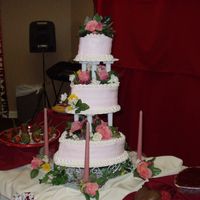 Valentine Party Cake This was a cake I made at work for a Senior Living Valentine's Day dance. White cake with vanilla buttercream. Flowers are silk.