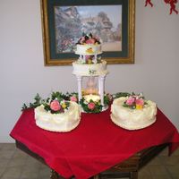 Valentine Dance Cake Another Valentine's day from work (senior living community). Heart shaped cakes with vanilla buttercream. Silk flowers.