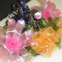 Sugar Flowers I took at class at Wilton on intro to pulled sugar. It was fun. Can't wait to practice. Fantasy flowers and roses and leaves.