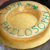 Lord Of The Rings This is a cake I "helped" my nephew make for class. Gold luster dust on fondant.