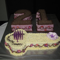 21St Birthday Cake chocolate cake with buttcream icing and decorated with chocolate shavings and fondant flowers. This was inspired by cakes on this site so...