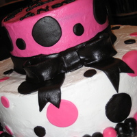 Sweet 16 This is a yellow butter cake with butter cream icing and fondant polka dots and ball border.