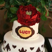 Baby Shower Cake This is a 10inch pumpkin spice cake with cream cheese icing and a 6inch red velvet cake with cream cheese icing. Covered in fondant and...