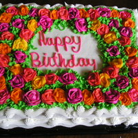 Rose Cake My boyfriends Mom was turning 60 and her name is Rose so there are sixty roses on this cake.