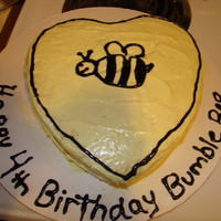 Bumble Bee's Birthday Heart Shaped Lemon Cake with Lemon Frosting. Black Gel Bumble Bee and Writing. Made in 30 MIns for a sudden Chuck e Cheese Birthday mini...