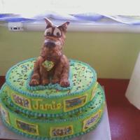 Scooby Doo was made for a very happy girl on her birthday.scooby is made of sculpted crispie treats ,covered in fondant ,then air brushed , the cake...