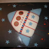 Rocket Cake This was the very first cake that I made using fondant. It was for my daughter's preschool Fun Fair, which had a space theme. I was so...