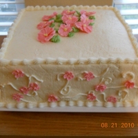 Pina Colada Pina Colada Cake with Pink Primroses and Appleblossoms