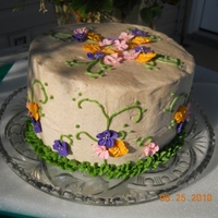 Cinnamon Bun Cinnamon Bun Cake with Buttercream/cinnamon icing, Apple Blossoms in Orange, Pink and Purple