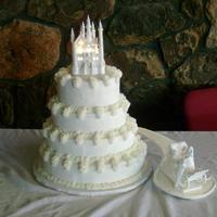 Lipford Wedding Four tired white cake with chocolate, strawberry, lemon and buttercream filling. As seen in Wilton's Yearbook.