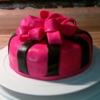 My First Fondant Cake This is my very first fondant cake. I made this with a butter box cake and the fondant is by Duff. Not very tasty. I have made some...