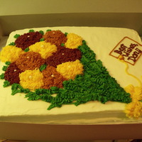 Retirement Bouquet Of Mums buttercream mums bouquet with bow and "card". Best Wishes indeed.