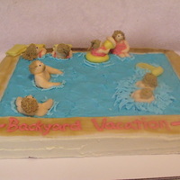 Pool Party Cake Blue Marble cake, buttercream frosting, fondant people and pool edging...made the members of the family each doing what they do, complete...