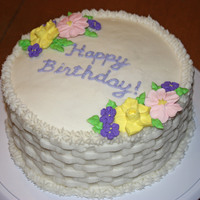 Wilton Class Cake This was my final cake for the Wilton Flowers and Cake Design class. The cake is iced with BC, the flowers are RI. This was my first time...