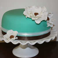 Just For Fun This is a chocolate cake with mocha buttercream filling. It is covered in fondant and decorated with gumpaste flowers. I used a heart...