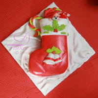 Stocking Christmas Santa Fondant Cake #2 Simple Fondant cake with Stocking Socks Shape and handmade Bells and miscellaneous decoration.