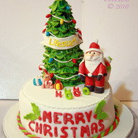 Christmas Tree And Santa Fondant Cake All Fondant Cake with Christmas tree and Santa.