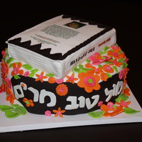 Book In A Garden This cake was for a bat mitzvah girl that is a writer. She is currently writing a book, so I made a cake with the book (as if she finished...