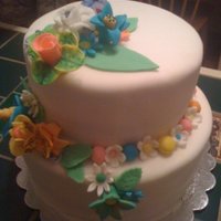 Hawaiin Cake All flowers made from fondant/ gumpaste, cake covered in fondant.