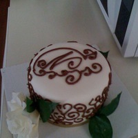 First Time Attempting Scroll Work "N" on top, practice scroll work cake