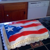Peurto Rican Flag Grooms Cake Waving flag cake made for a groom, filled with guava.