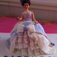 Barbie Princess Cake Barbie princess cake for my daughters 2nd birthday. First attempt at barbie, all yellow cake no filling.