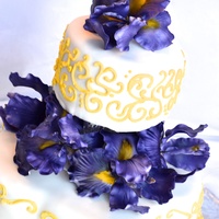 Iris Wedding Cake yellow and purple were the wedding colors so we went with yellow piping and purple sugar iris's.