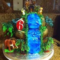 Ice Age Birthday Cake I made this cake for one of my son's when he turned 6 years old. He loves the ice age movies. Im new to making cakes, I started a year...