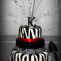 Sweet 16 Zebra Cake My mom and I made thisfor my Sweet 16. Neither of us have taken ANY sort of cake class and this is only the second one my mom has done and...