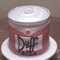Duff Beer Cake Modeled after a can of Homer Simpson's favorite beer. All cake and fondant.