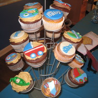 Sissys Baby Shower Made chocolate cupcakes with peanut butter fluff frosting and banana cupcakes with chocolate hazelnut frosting. All covered with MMF...