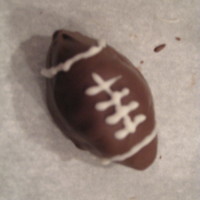 Are You Ready For Some Football?!! Chocolate cake balls decorated like footballs:)