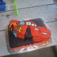 Car's Cake Lightning McQueen cake for my nephew's 2nd birthday. Bottom cake is white cake, white cream filling covered in chocolate fondant. Top...
