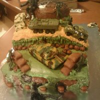 Army /g.i. Joe Cake Made this for a 5yr olds b-day. Bottom layer yellow, middle lemon, top chocolate. green shades are cream cheese buttercream frosting.......