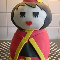 Kokeshi Doll I tried to do a japanese kokeshi doll. I find them so beautiful. It's chocolate cake with a chocolate creamcheese filling - yummy!